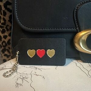 Coach black large hang tag stamped hearts 💛❤️💛